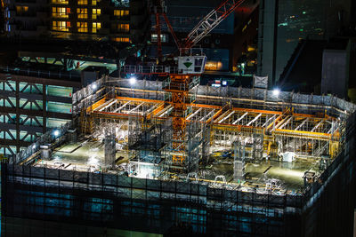 Illuminated buildings in city at night