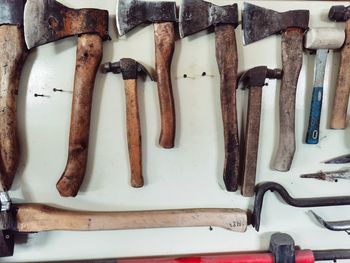 Hammer and tools on wooden table