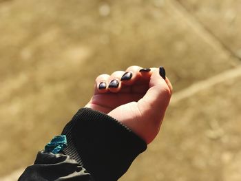 Close-up of woman hand with nail polish