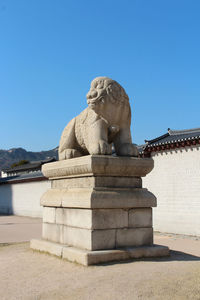 Statue against clear sky