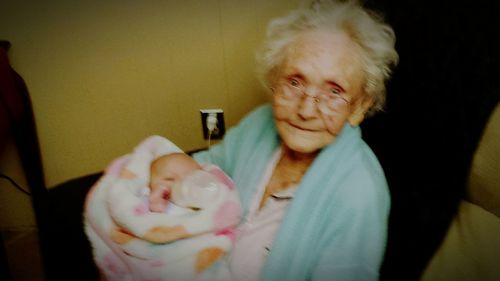 Portrait of woman holding ice cream