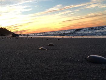 Scenic view of sea at sunset