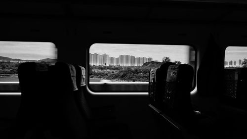 Woman looking at cityscape