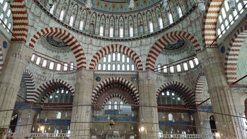 Low angle view of illuminated ceiling