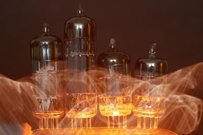 Close-up of wine bottles on table