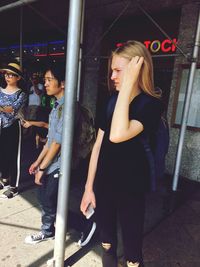 Young woman standing outdoors