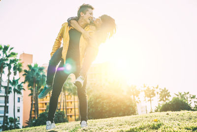 Woman piggybacking partner