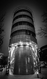 Low angle view of modern building at night