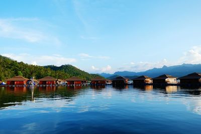 Scenic view of lake against blue sky