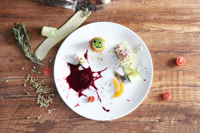 Directly above shot of fruits served on table