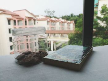 Close-up of small window on table in building