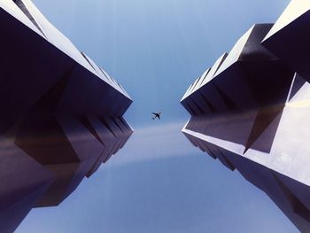 Low angle view of skyscrapers against sky