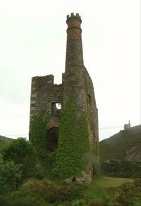 Old ruin tower against sky