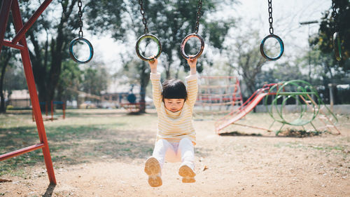 Girl playing in playground