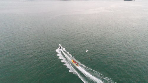 High angle view of ship sailing on sea