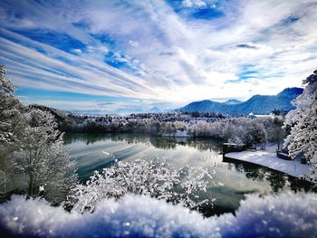 Scenic view of frozen lake against sky