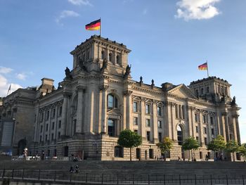 Low angle view of reichstag building against sky