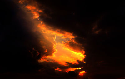 Low angle view of dramatic sky during sunset