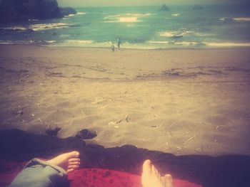 Low section of man on beach