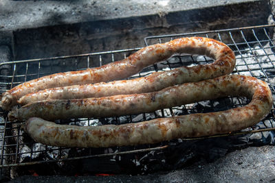 Close-up of meat on barbecue grill