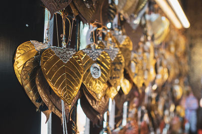 Close-up of clothes hanging in store for sale