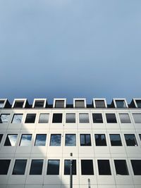 Low angle view of modern building against clear sky