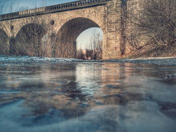 Arch bridge over river