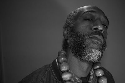 Portrait of a man against wall