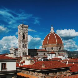 Temple against blue sky in city