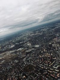 Aerial view of city against sky