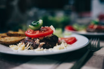 Close-up of food served in plate on table