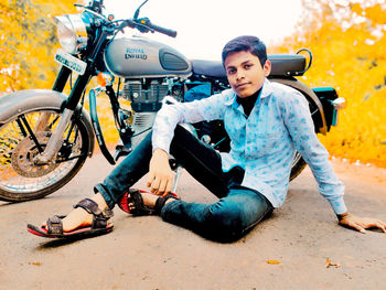 Young man riding bicycle