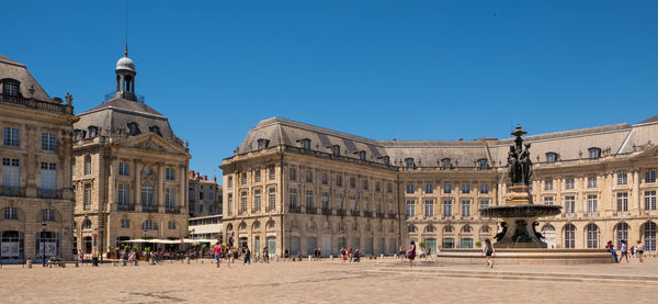 Group of people in front of building