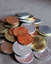 High angle view of coins on table