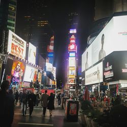 Crowd in city at night