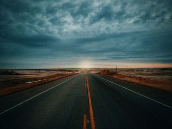 Road against sky at dusk
