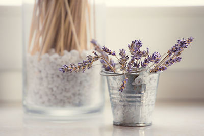 Close-up of flower vase on table