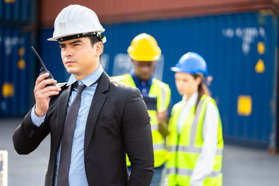 Young man working at camera