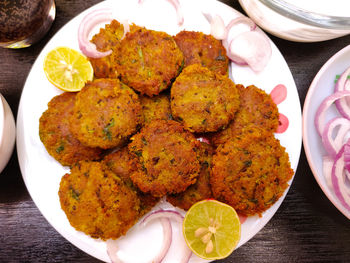 Close-up of food served on table