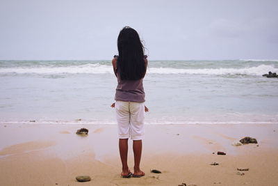 People standing on beach