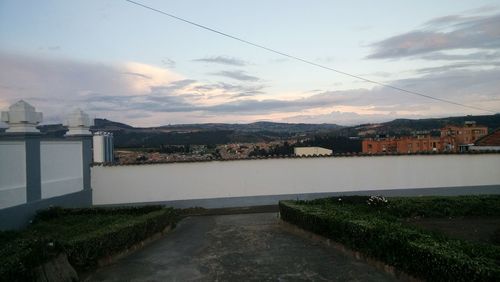 Scenic view of residential district against sky