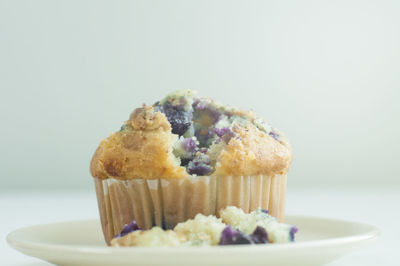 Close-up of cupcakes against white background