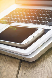 High angle view of smart phone on table