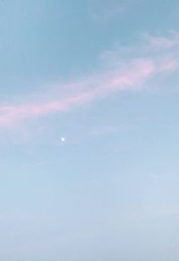 Low angle view of moon in sky