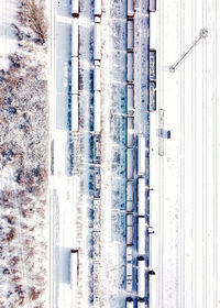 High angle view of vehicles on road during winter
