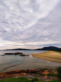 Scenic view of beach against sky
