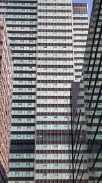 Low angle view of modern buildings in city
