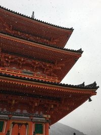 Close-up of red structure against sky