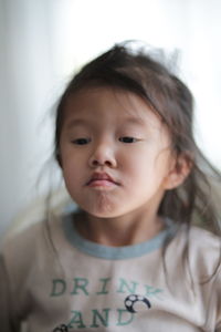 Close-up of girl at home