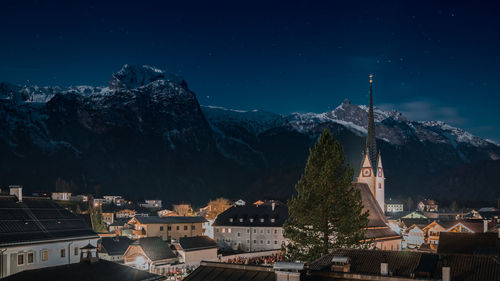 High angle view of townscape against sky at night